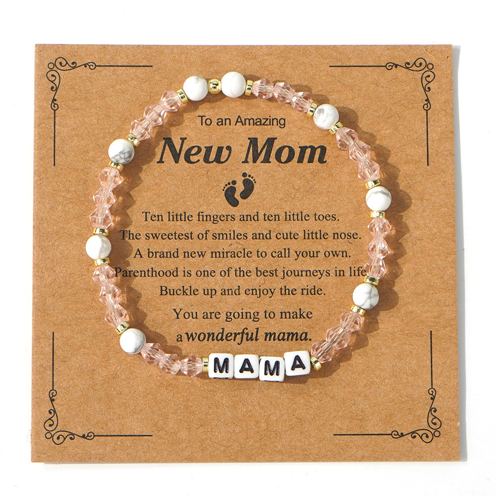 Adjustable silver bracelet engraved with “Mom”