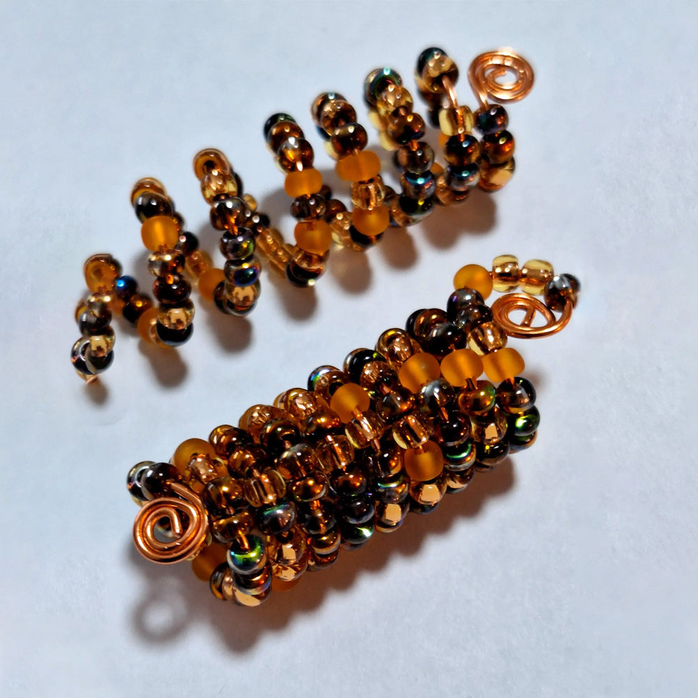 Handmade glass bead hair accessories in rainbow tones
