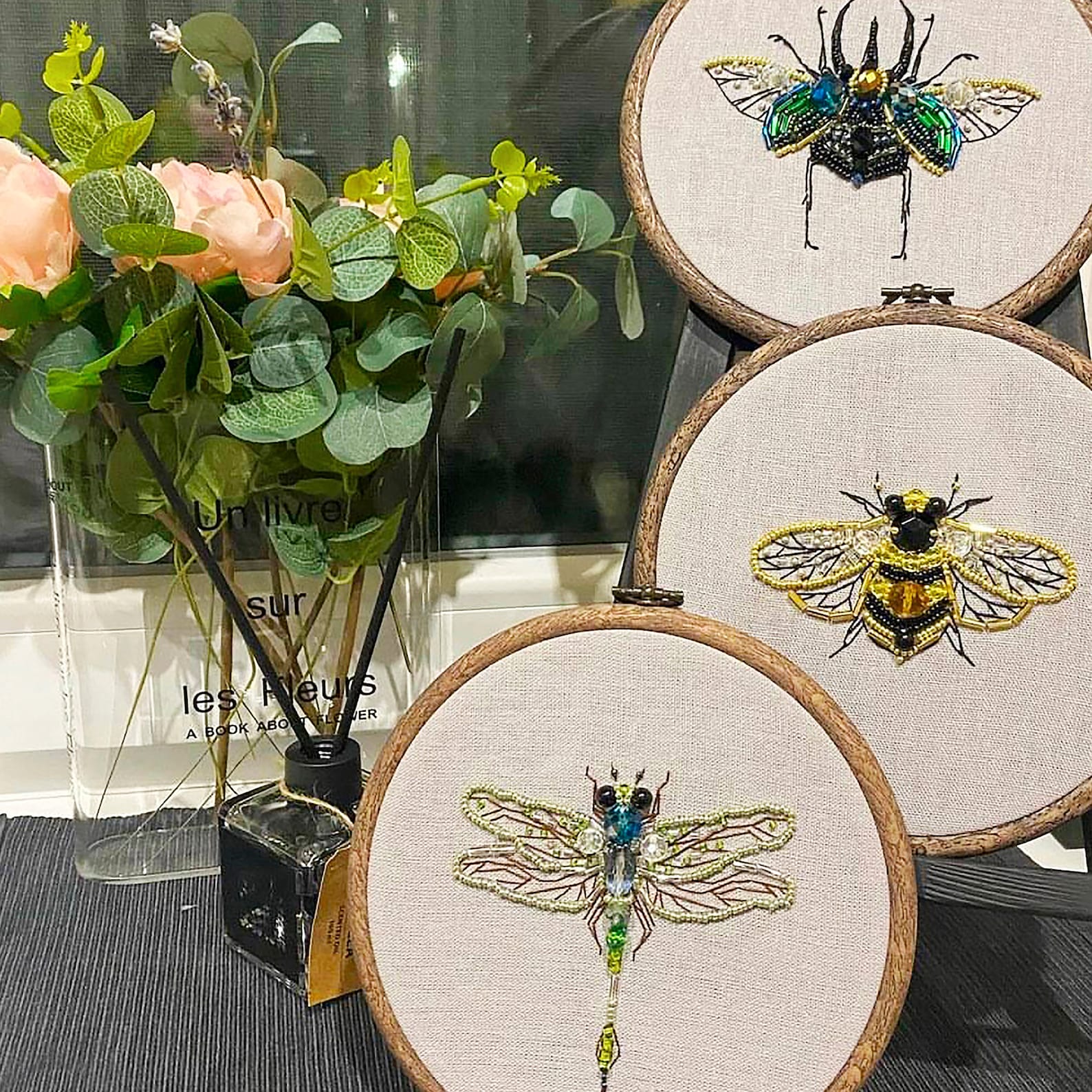 Insect-themed embroidery with beads and sequins