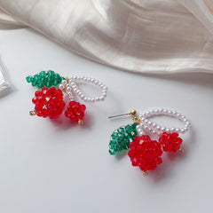 Statement cherry earrings with green beaded stems


